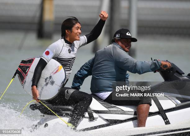 Kanoa Igarashi of Japan and surfing for the World Team celebrates after his wave, before his team won the final of the WSL Founders' Cup of Surfing,...