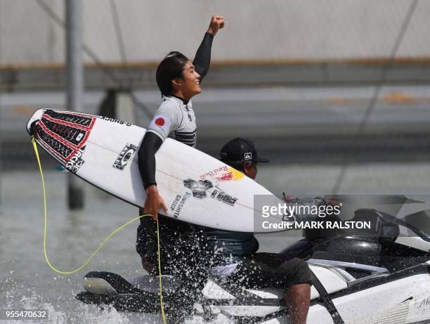 Kanoa Igarashi of Japan and surfing for the World Team celebrates after his wave, before his team won the final of the WSL Founders' Cup of Surfing,...
