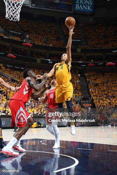 Dante Exum of the Utah Jazz handles the ball against the Houston Rockets during Game Four of the Western Conference Semifinals of the 2018 NBA...