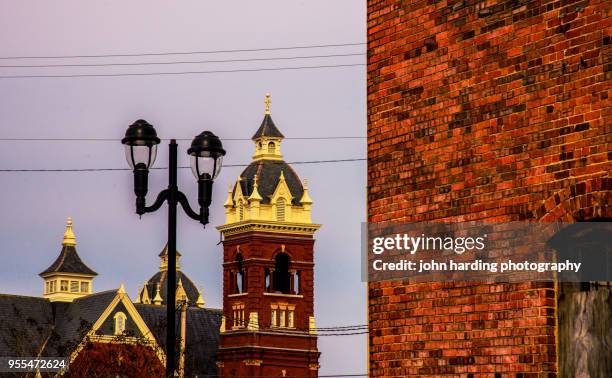 bell tower: queen street united methodist church - methodist stock pictures, royalty-free photos & images