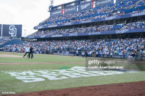 Pepe Maiz President of Sultanes and Vice president Wilie Gonzalez launch the first ball prior the MLB game between the San Diego Padres and the Los...