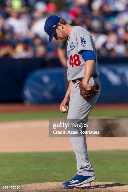 Relief pitcher Brock Stewart of Los Angeles Dodgers prepares to pitch in the eight inning during the MLB game against the San Diego Padres at Estadio...