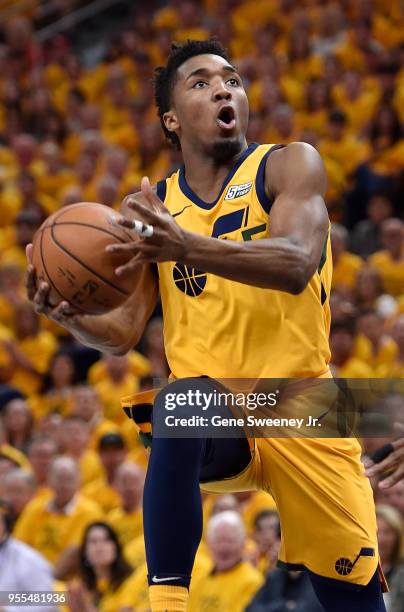 Donovan Mitchell of the Utah Jazz goes to the basket in the first half during Game Four of Round Two of the 2018 NBA Playoffs against the Houston...