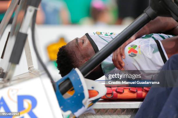 Djaniny Tavares of Santos leaves the field after being injured during the quarter finals second leg match between Santos Laguna and Tigres UANL as...