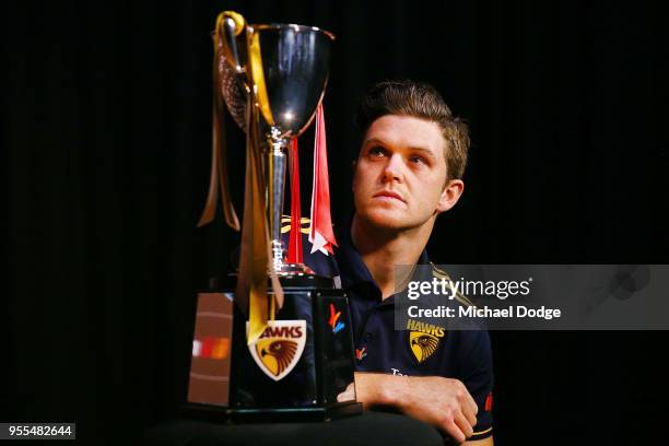 Taylor Duryea of the Hawks poses with the beyondblue Cup speaks to the media during a Hawthorn Hawks AFL media opportunity at Waverley Park on May 7,...