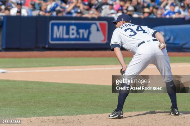 Relief pitcher Craig Stammen of San Diego Padres prepares to pitch in the sixth inning during the MLB game against the Los Angeles Dodgers at Estadio...