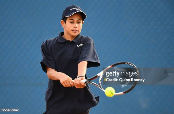 Zachary Viiala of Australia plays a backhand during the Australian Launch of the Longines Future Tennis Aces Tournament at Melbourne Park on May 7,...