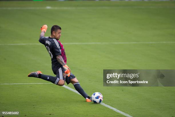 Real Salt Lake goalkeeper Nick Rimando kicks the ball during the soccer match between the Orlando City Lions and Real Salt Lake on May 6, 2018 at...