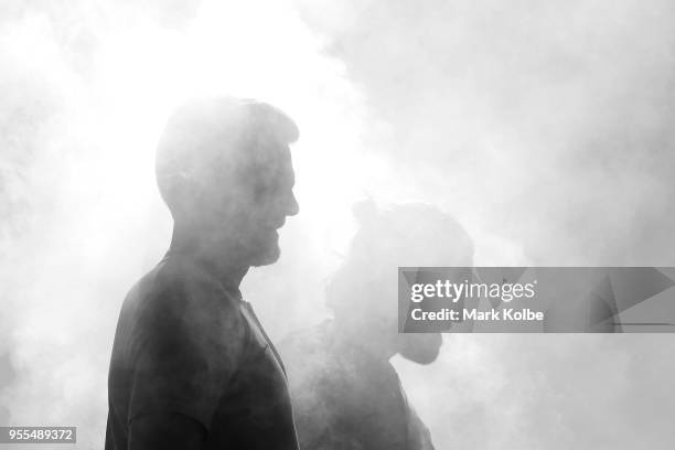 Josh Risdon and Josh Brillante pose in smoke during a photo shoot after the Australian Socceroos World Cup Preliminary Squad Announcement at Lady...