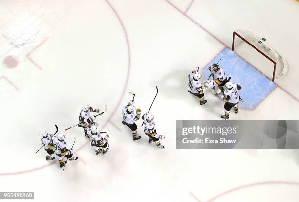 Marc-Andre Fleury of the Vegas Golden Knights is congratulated by teammates after he shut out the San Jose Sharks to win Game Six of the Western...