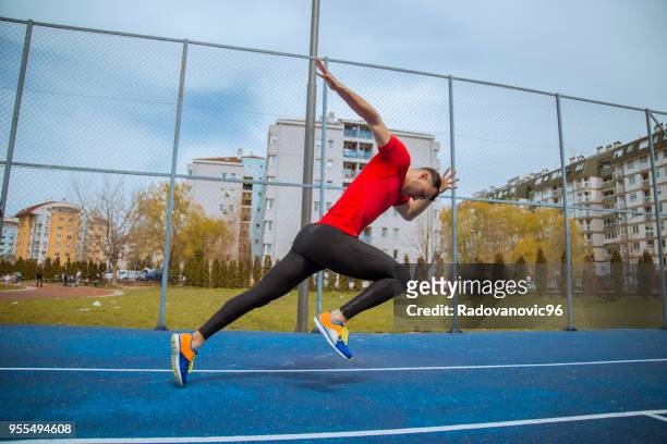 young male having a training session - high contrast athlete stock pictures, royalty-free photos & images