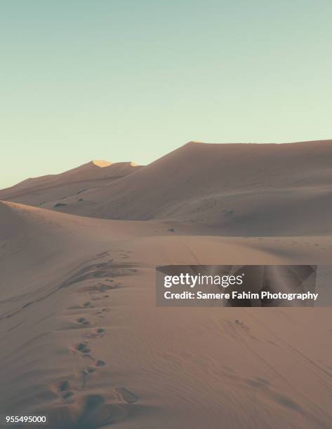 scenic view of sand dunes against clear sky - samere fahim bildbanksfoton och bilder