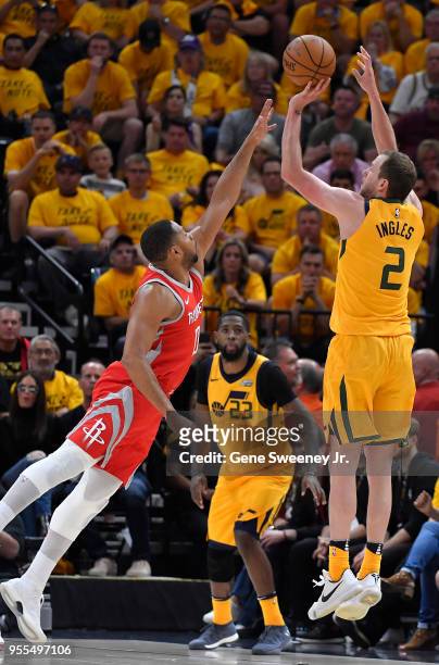 Joe Ingles of the Utah Jazz shoots over the defense of Eric Gordon of the Houston Rockets in the second half during Game Four of Round Two of the...