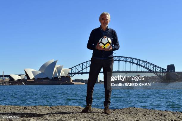 Bert van Marwijk, head coach of the Australian national football team, poses during a photo session in front of the Opera House and Harbour Bridge,...