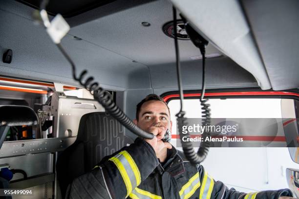 brandman körning - akut ring - emergency services occupation bildbanksfoton och bilder