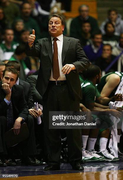 Head coach Tom Izzo of the Michigan State Spartans gives a "thumbs up" to a player against the Northwestern Wildcats on January 2, 2010 at Welsh-Ryan...