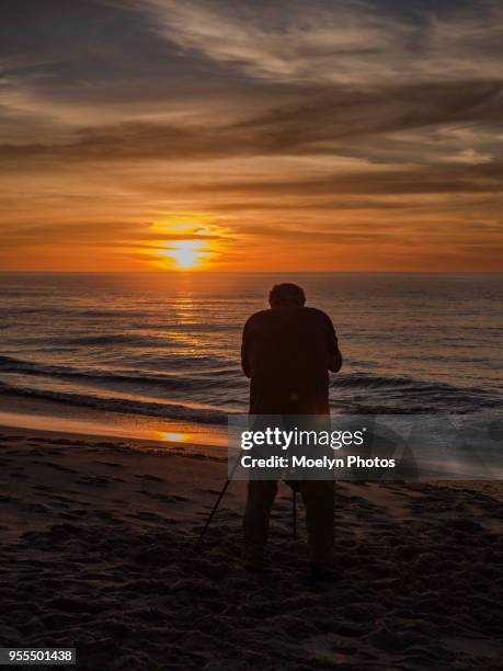 photographing at moss landing sunset - moss landing stock pictures, royalty-free photos & images