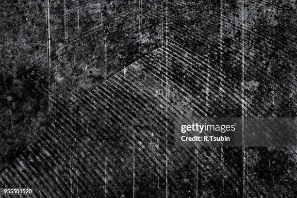 old grungy scratched stone wall as abstract background texture - beton wall stock pictures, royalty-free photos & images