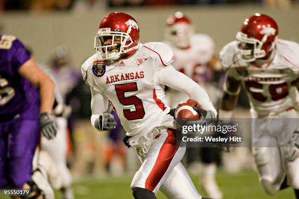 Tramain Thomas of the Arkansas Razorbacks returns a interception during the Liberty Bowl against the East Carolina Pirates at AutoZone Liberty Bowl...