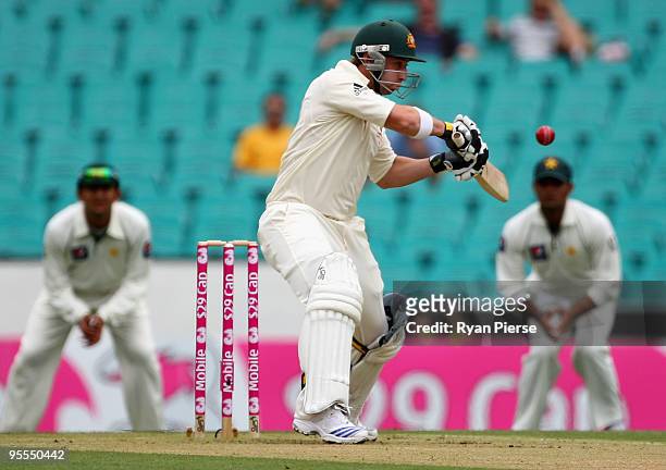 Phillip Hughes of Australia plays a cut shot and is droppped during day one of the Second Test match between Australia and Pakistan at Sydney Cricket...
