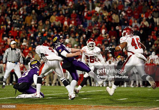 Ben Hartman of the East Carolina Pirates misses a field goal attempt in overtime against the Arkansas Razorbacks during the 51st Annual Autozone...