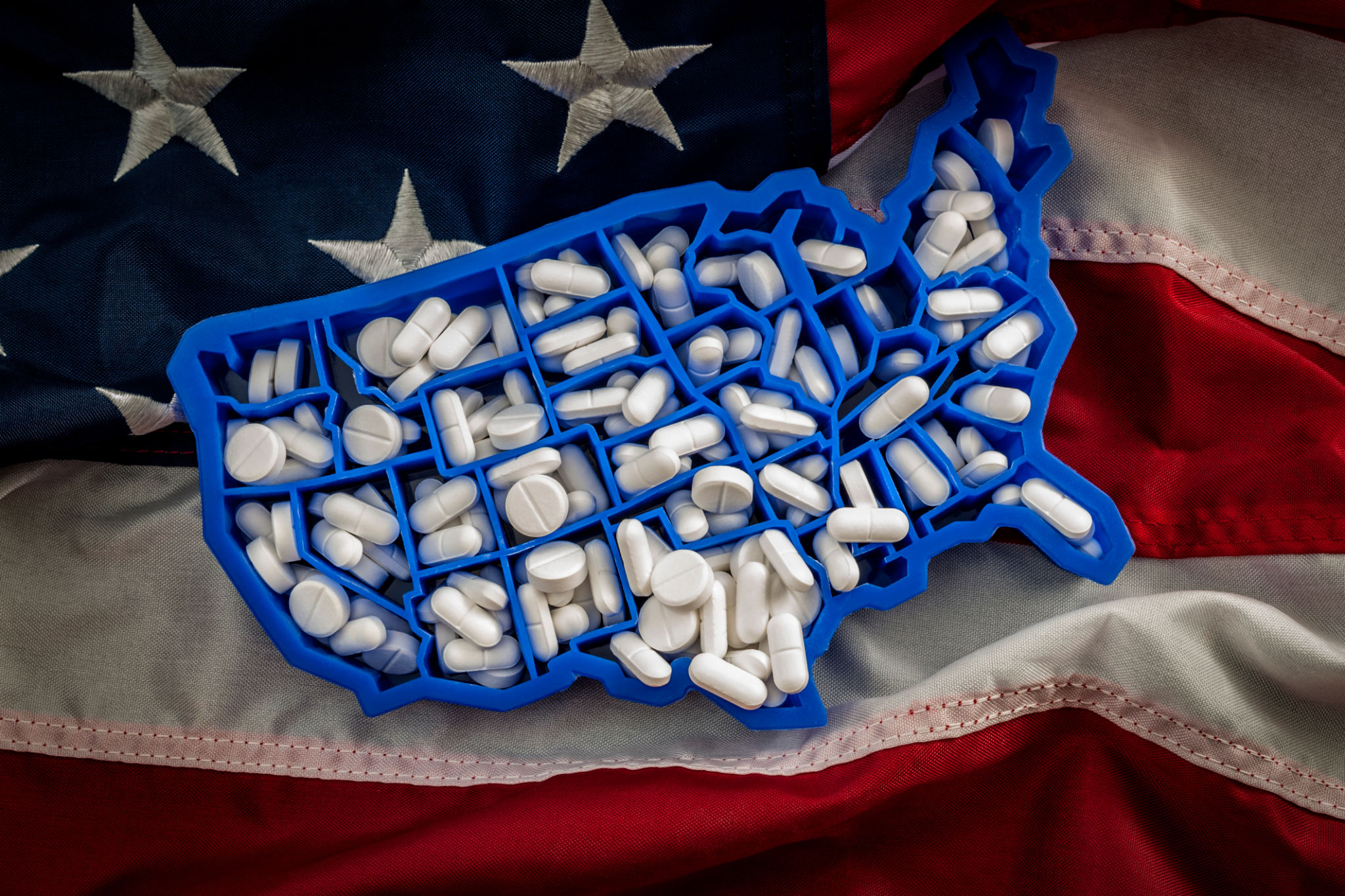 American map covered with opioid painkillers like oxycodone and hydrocodone American map covered with opioid painkillers like oxycodone and hydrocodone
