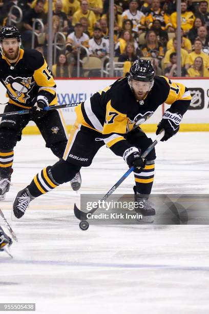 Bryan Rust of the Pittsburgh Penguins controls the puck in Game Four of the Eastern Conference Second Round during the 2018 NHL Stanley Cup Playoffs...