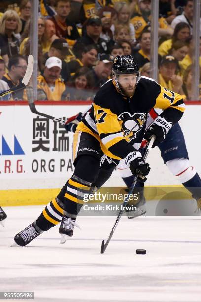 Bryan Rust of the Pittsburgh Penguins controls the puck in Game Four of the Eastern Conference Second Round during the 2018 NHL Stanley Cup Playoffs...