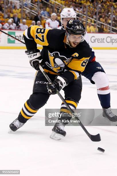 Sidney Crosby of the Pittsburgh Penguins controls the puck in Game Four of the Eastern Conference Second Round during the 2018 NHL Stanley Cup...