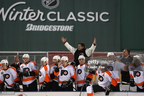 Peter Laviolette, head coach of the Philadelphia Flyers, reacts during the game against the Boston Bruins during the 2010 Bridgestone Winter Classic...