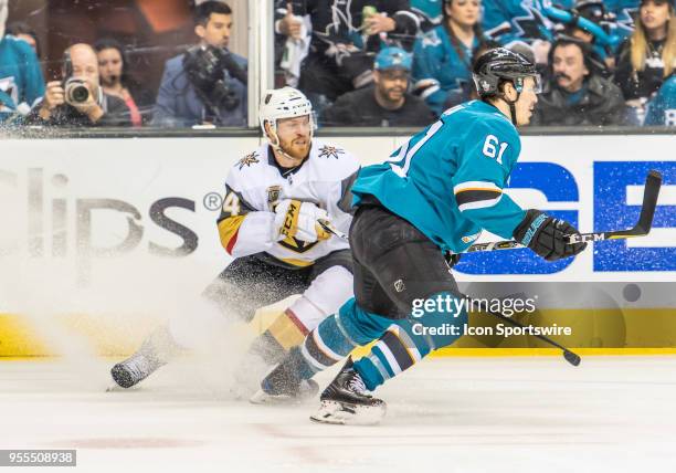 Vegas Golden Knights center Oscar Lindberg and San Jose Sharks defenseman Justin Braun hustle on the San Jose Sharks end during game 6 of the second...