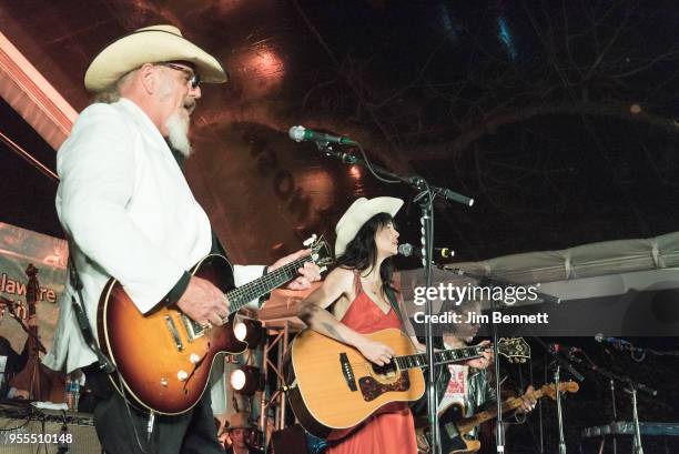 Lead guitarist and vocalist Ray Benson and singer and guitarist Nikki Lane perform live on stage at Ray's 67th birthday party concert benefiting...