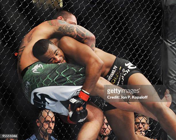 Fighter Rashad Evans battles UFC fighter Thiago Silva during their non title Light Heavyweight fight at UFC 108: Evans vs. Silva at the MGM Grand...