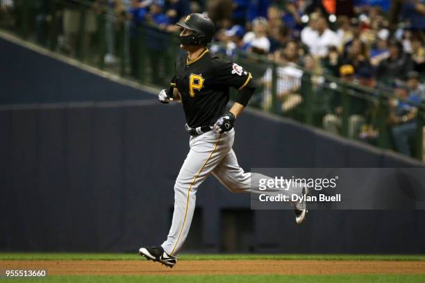 David Freese of the Pittsburgh Pirates rounds the bases after hitting a home run in the ninth inning against the Milwaukee Brewers at Miller Park on...