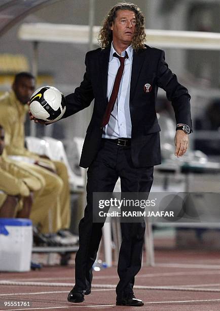 Qatar's French coach Bruno Metsu attends his team's 9th International Friendship Tournament football match against Mali in Doha on January 2, 2010....