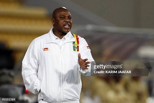Mali's national football team coach Stephen Keshi gives instructions to his players during their 9th International Friendship Tournament football...
