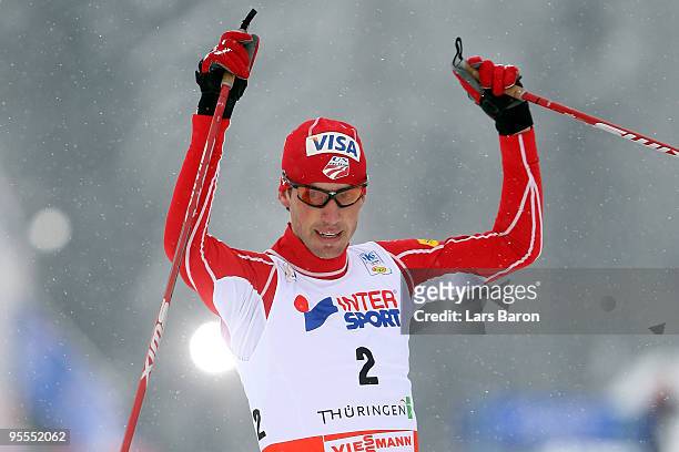 Johnny Spillane of USA celebrates after winning the cross country event of the FIS Nordic Combined World Cup on January 3, 2010 in Oberhof, Germany.
