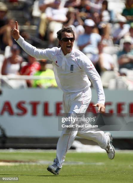 Graeme Swann of England celebrates taking the wicket of AB de Villiers of South Africa after he was caught out by Andrew Strauss of England for 36...