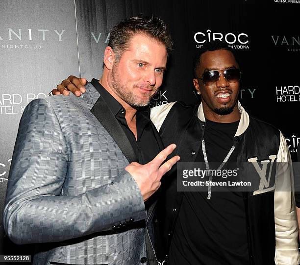 Pro baseball player Jason Giambi and fashion designer/recording artist Sean "Diddy" Combs attend the grand opening of the Vanity nightclub hosted by...