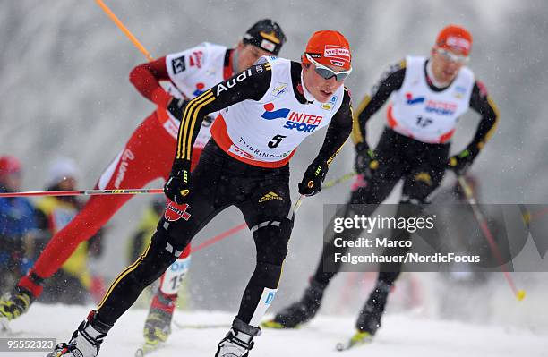 Eric Frenzel of Germany competes in the Gundersen 10km Cross Country event during day two of the FIS Nordic Combined World Cup on January 3, 2010 in...