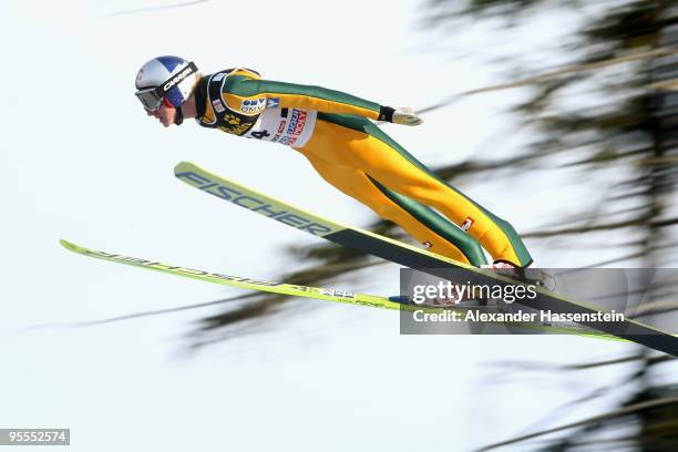 Gregor Schlierenzauer of Austria competes during first round of the FIS Ski Jumping World Cup event of the 58th Four Hills ski jumping tournament on...