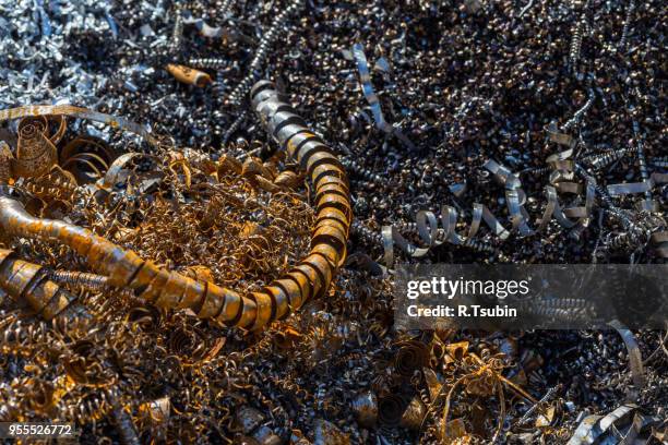 image of a lot of a bright metal shaving - oily slippery stockfoto's en -beelden