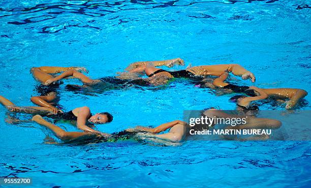 United States' team competes during the synchronised technical final on July 19, 2009 at the FINA World Swimming Championships in Rome. Team Russia...