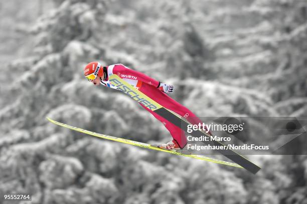 Eric Frenzel of Germany competes in the Gundersen Ski Jumping HS 140 event during day two of the FIS Nordic Combined World Cup on January 3, 2010 in...