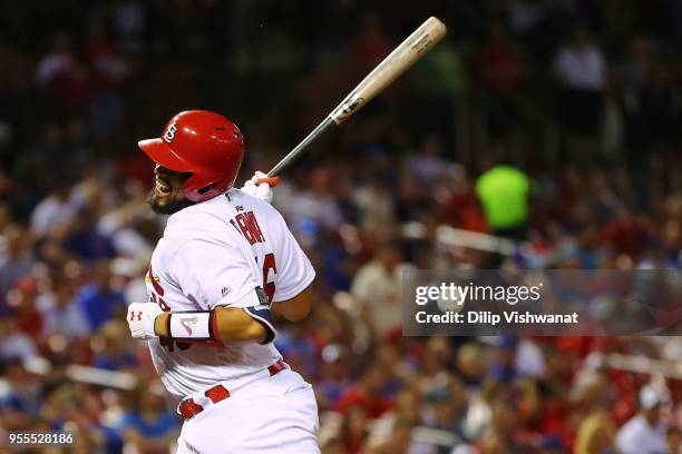Francisco Pena of the St. Louis Cardinals is hit by a pitch against the Chicago Cubs in the sixth inning at Busch Stadium on May 6, 2018 in St....