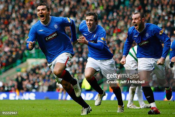 Lee McCulloch of Rangers celebrates with Kris Boyd after scoring during the Scottish Premier League match between Celtic and Rangers at Celtic Park...