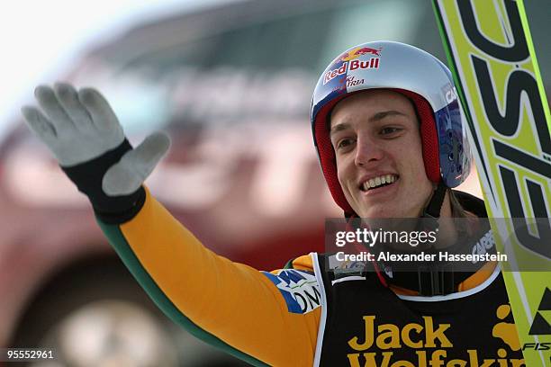 Gregor Schlierenzauer of Austria celebrates winning after his final jump of the FIS Ski Jumping World Cup event of the 58th Four Hills ski jumping...