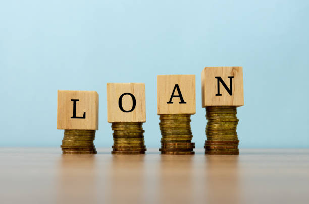 The 10 Best Small Business Loan Lenders in South Africa 1 loan text written on wooden block with stacked coins