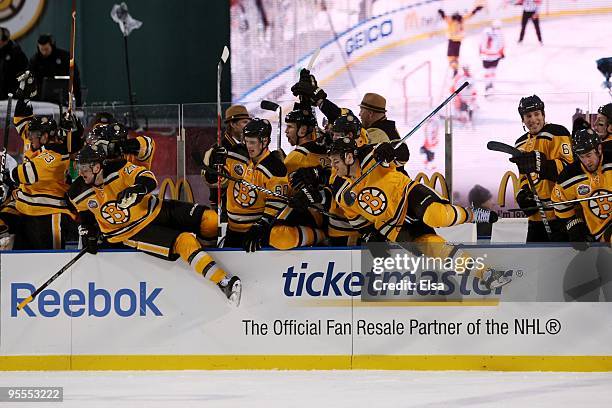 Players on the Boston Bruins leave the bench to celebrate their 2-1 overtime victory over the Philadelphia Flyers during the 2010 Bridgestone Winter...