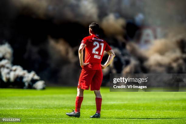 Danny Holla of FC Twente, smoke during the Dutch Eredivisie match between FC Twente Enschede and NAC Breda at the Grolsch Veste on May 06, 2018 in...